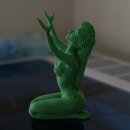 3D‑Printed Kneeling Green Arcane Sorceress (left)