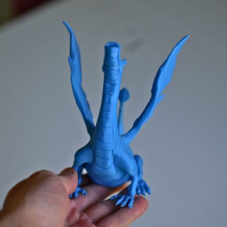 Blue 3D Printed Singing Serpent Adalinda held in hand