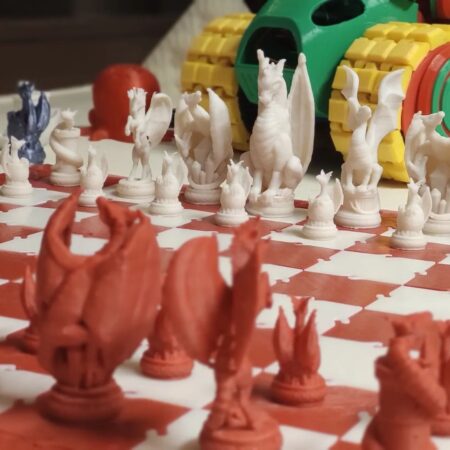 Chessboard set closeup with other designs in the background